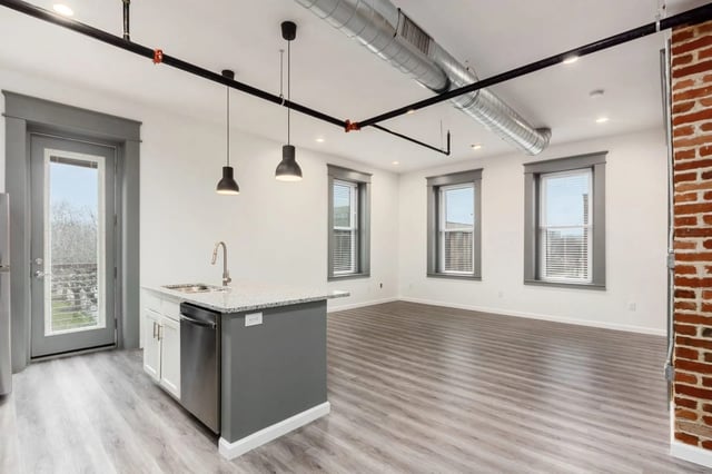 The Residences at 218 E Main St — Flooring & plumbing fixtures