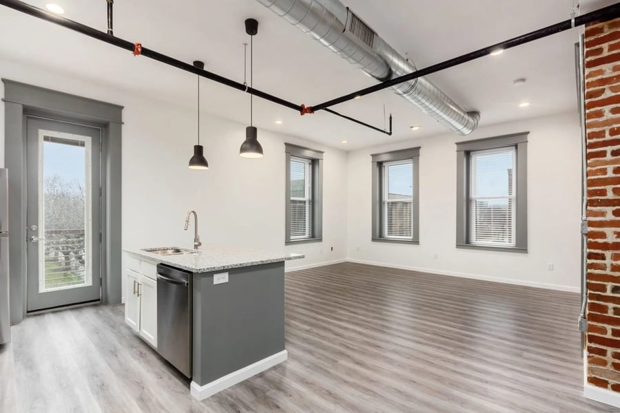 The Residences at 218 E Main St — Flooring & plumbing fixtures
